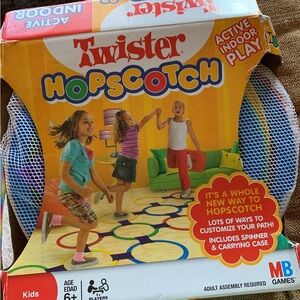 Hasbro Twister Hopscotch Game - Red, Blue, Yellow